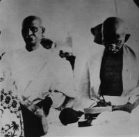 Gandhiji giving notes to Sardar Ballbvai Patel on board, the S. S. Rajputana on his way to London for attaining the Secon Round Table Conference in 1931.jpg